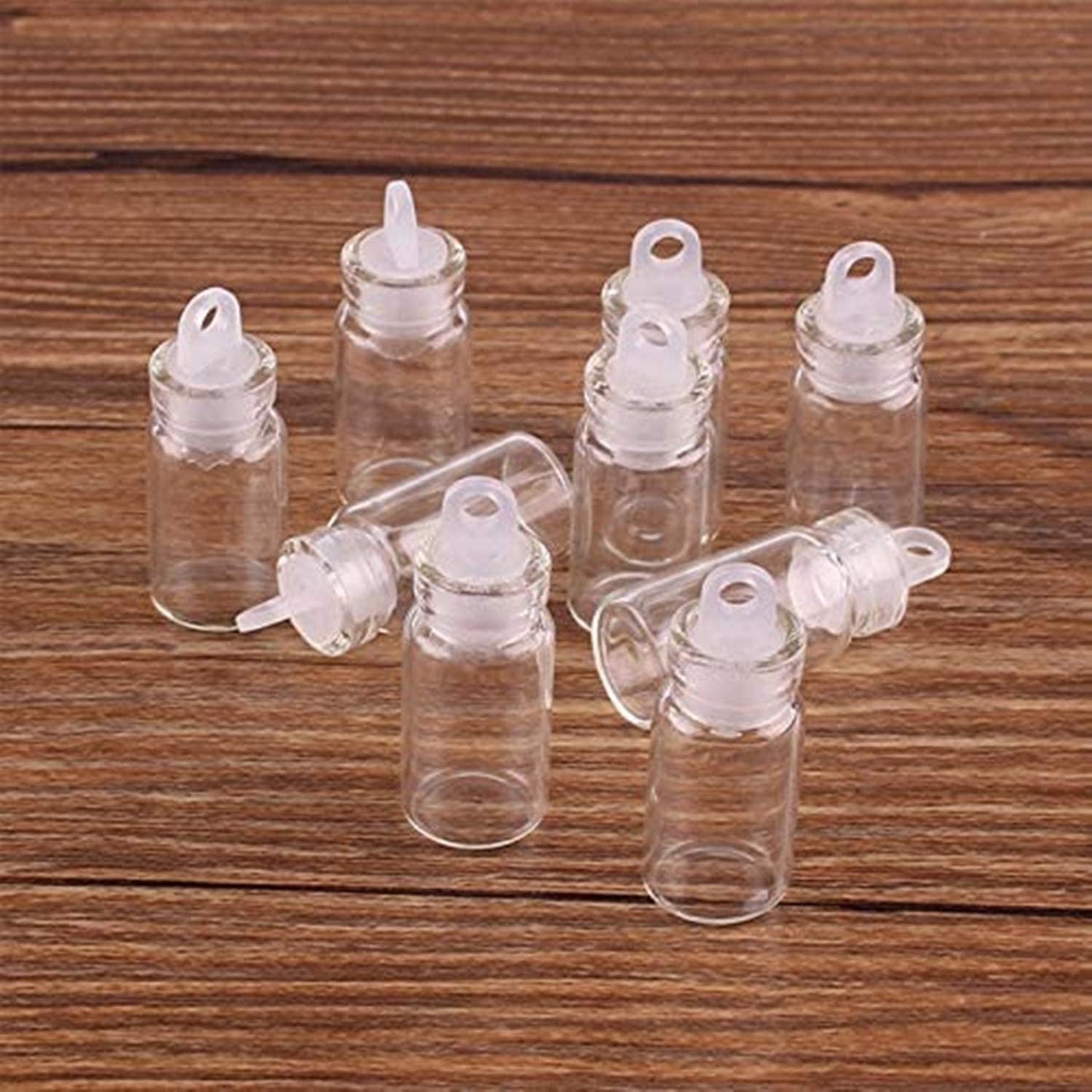 Minsily 100 Pcs 1ml Mini Small Glass Bottles with Plastic Stopper 20m Twines Clear Tiny Jar Small Glass Vials Wishing Bottle Charm Vials Arts Crafts Bottles DIY Decoration Wedding Party Favors Gifts