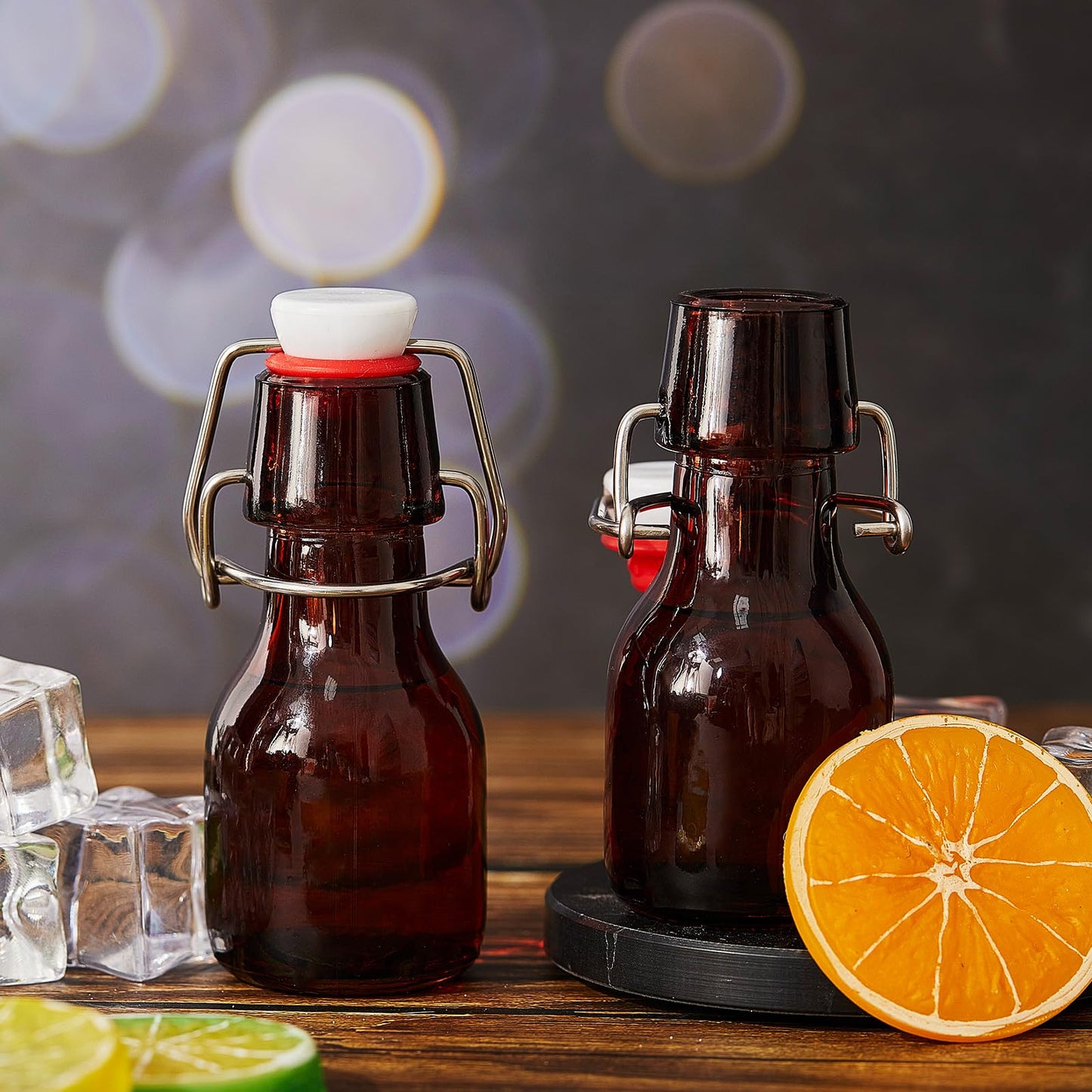 Tessco 24 Pcs Mini Swing Top Glass Bottles with Stoppers Small Flip Top Bottles with Airtight Lids for Crafts Decoration Wedding Themed Party Favors(2 oz,Amber)