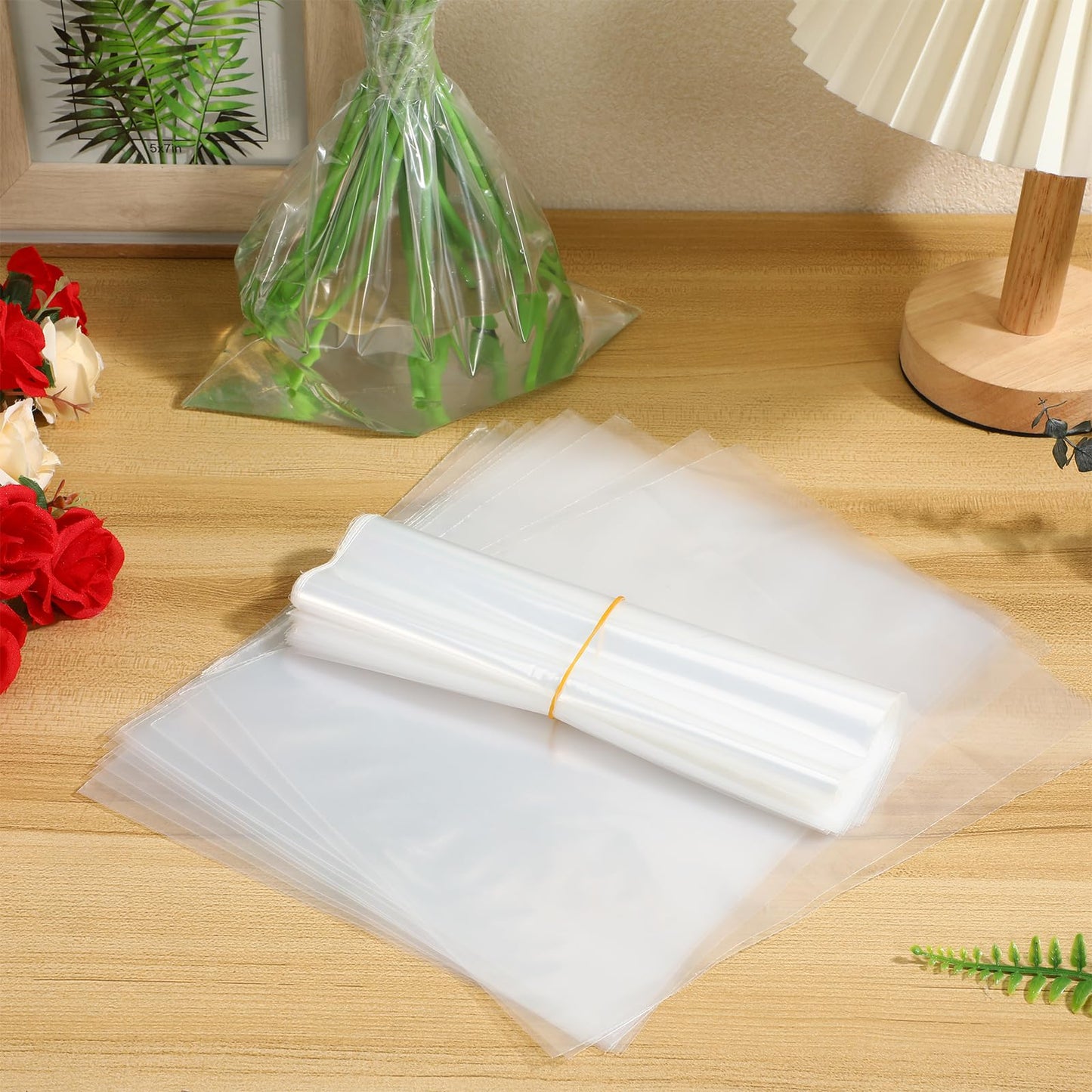 TOPPERFUN 50Pcs Flower Bags, 9.8x5.9in Bouquet Water-retaining Bag Protector, Rose Packaging for Arrangement, PE Water Floral Sleeves for Wedding Graduation and Mother's Day Florist Wrapping Supplies
