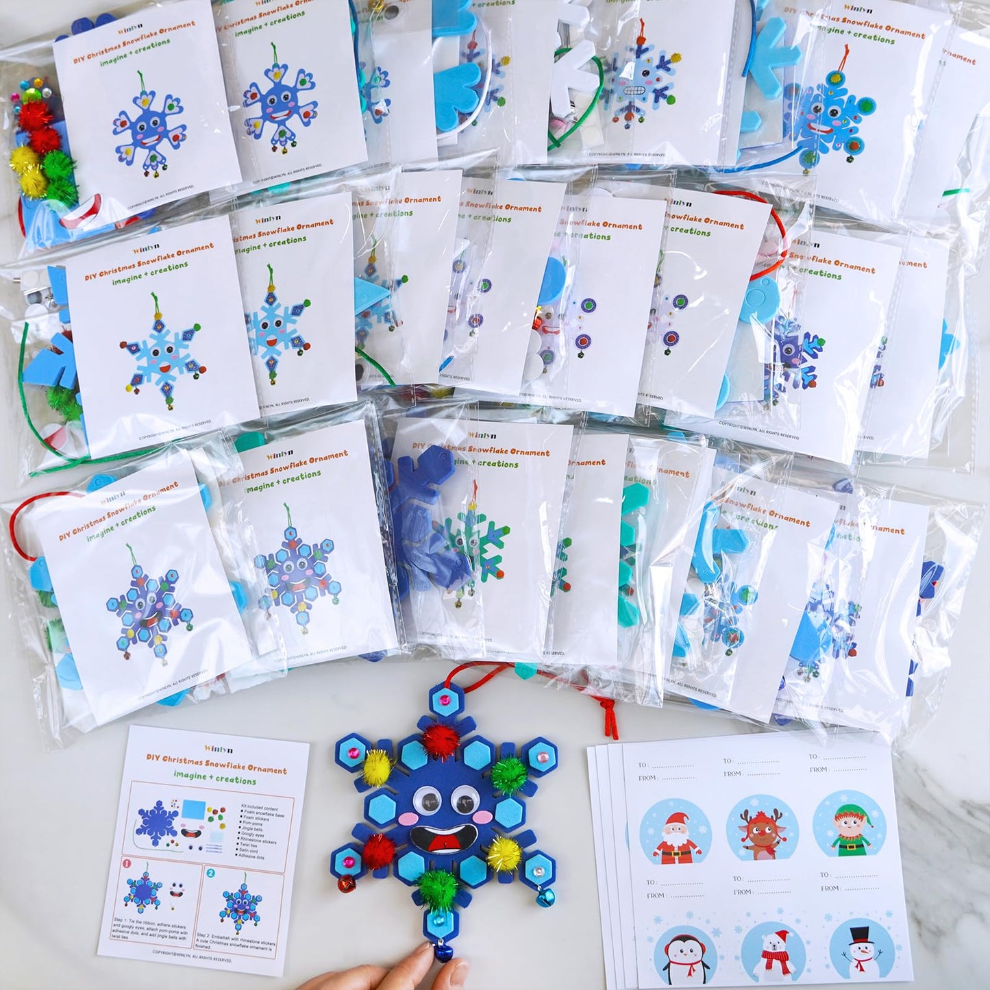 Winlyn 24 Sets Christmas Craft Kits Winter Crafts DIY Snowflake Ornaments Decorations Art Sets Foam Snowflakes Smile Stickers Jingel Bells for Kids Holiday Home Classroom Activities Party Favors
